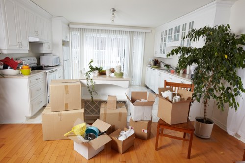 Collection team removing old furniture from an Aldgate property