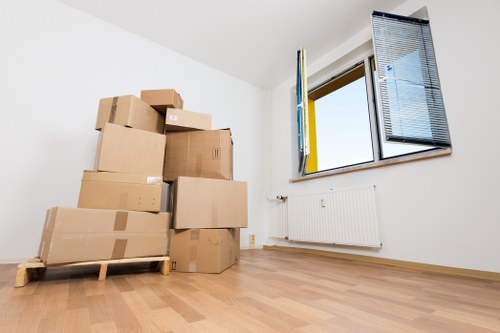 Careful furniture handling during a move in Aldgate