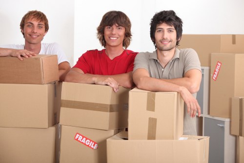 Student removals planning in Aldgate with packed boxes and moving checklist