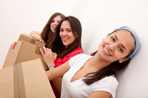 Packed boxes and furniture prepared for an Aldgate home relocation