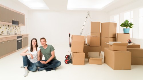 Packed moving boxes prepared for flat removals in Aldgate