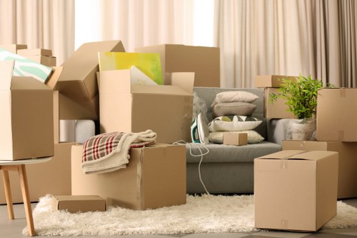 Carefully packed household items in labeled boxes for an Aldgate move
