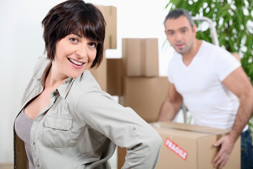 Professional movers handling stair access in a central London flat move